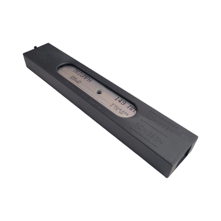 A sleek black plastic safety dispenser for scraper blades with a visible 'Triumph' stainless steel blade through the inspection window.