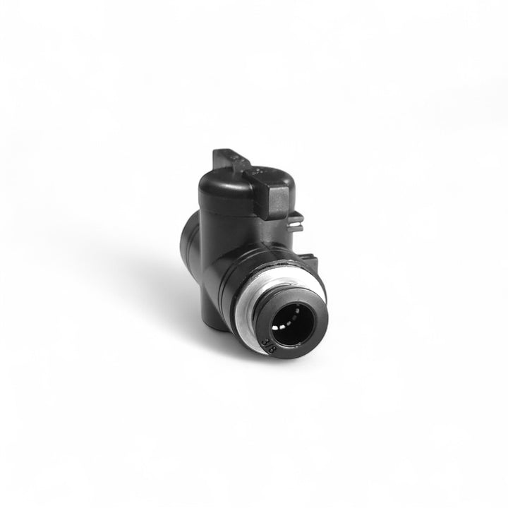 Black mechanical component on a white background