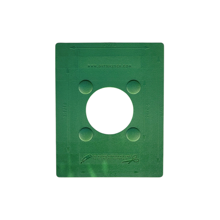 square-shaped plastic plate with a circular hole in the center, measurement markings, and four raised circular areas. The website URL “www.gutterstick.com” is embossed at the top, and cutting guidelines are visible for adjusting the size.