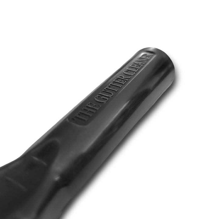 Close-up of the handle of "The Gutter Cleaner" showing the embossed product name along its length.