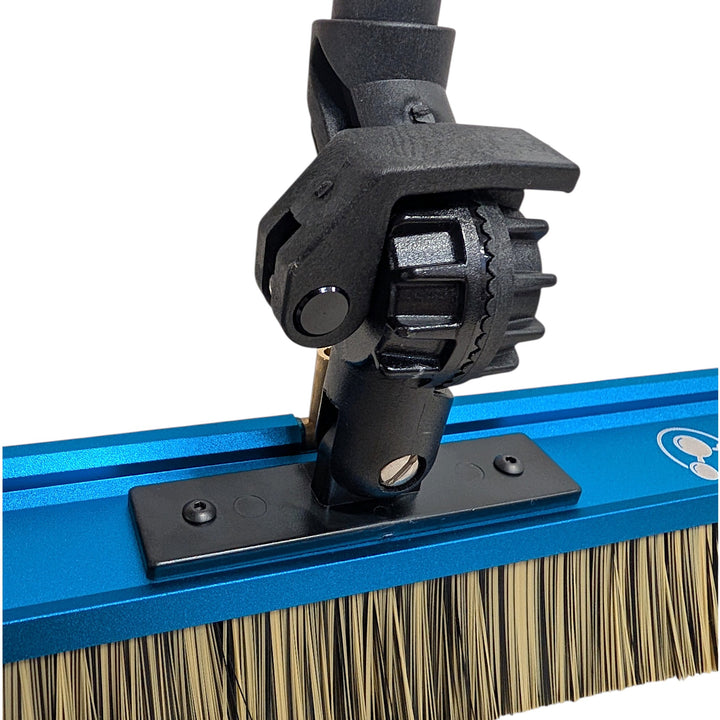 Close-up of the PWP Swivel Lite brush’s black swivel joint and toothed adjustment knob on the blue block.