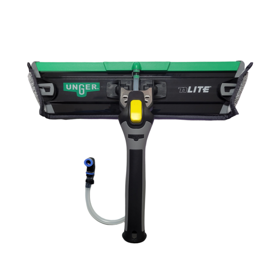 Frontal view of the Unger PowerPad Complete window cleaning tool showing the full width of the green rinse bar and the microfiber pad extending across the bottom. The grey handle with yellow accents stands vertically with a blue quick-connect water fitting on the left side.
