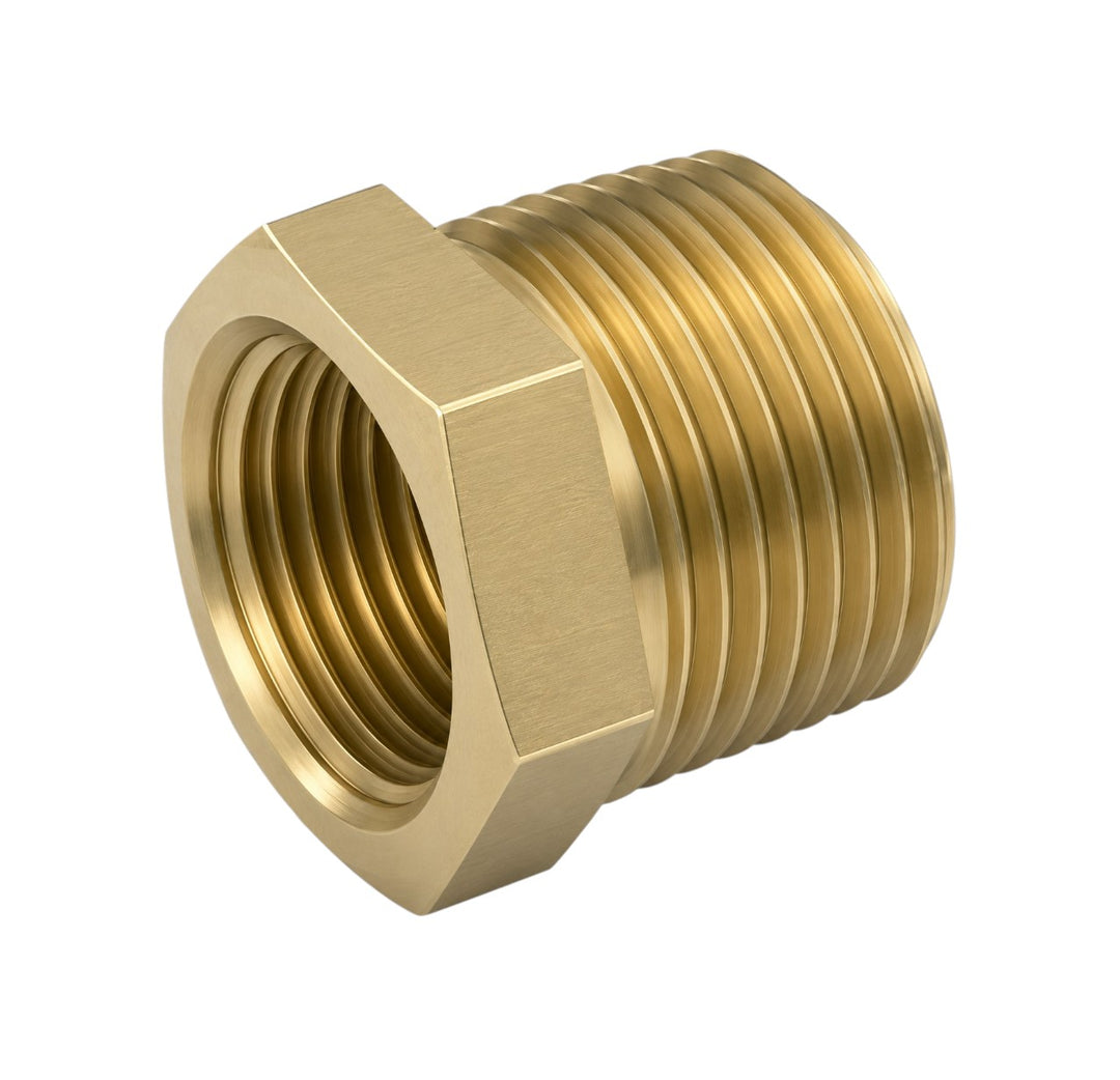 Brass hex nut on a white background