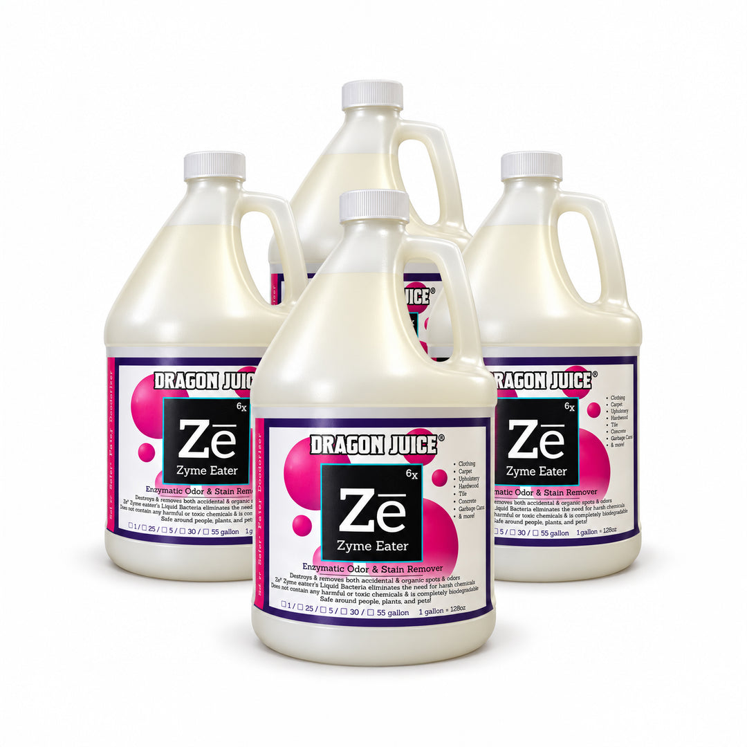 Four one-gallon jugs of Dragon Juice Zē Zyme Eater enzymatic odor and stain remover arranged in a group.