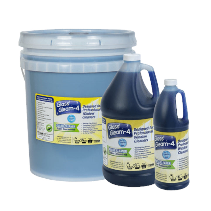 A five-gallon pale-blue pail, alongside a one-gallon and a quart-sized bottle of Glass Gleam-4™ Window Cleaning Concentrate, all sharing a similar design. The containers are labeled with usage instructions and key product benefits, emphasizing its suitability for professional window cleaning.