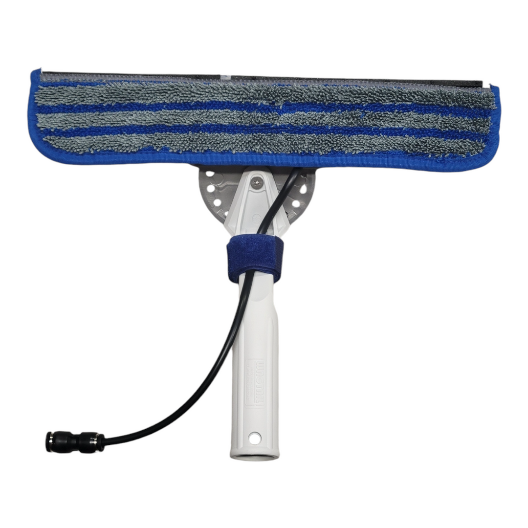 Front-facing view of the Wagtail Jetstream cleaning tool, displaying the dual-material microfiber pad and ergonomic handle with the connected water hose attachment.