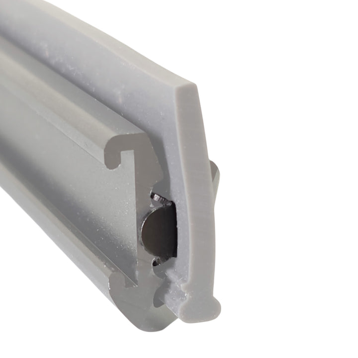 Black metal end clip installed inside a wide-body squeegee channel to secure the rubber blade