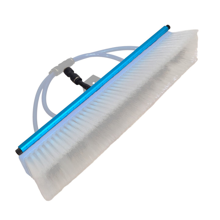 PWP aluminum rinse bar installed on a water-fed brush with blue supply tubing.