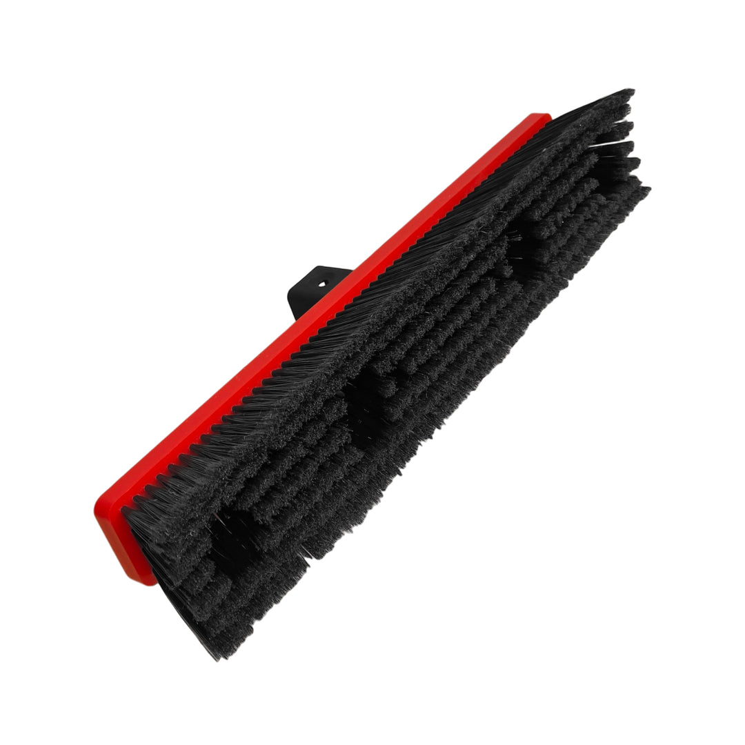 A heavy-duty cleaning brush with dense black bristles and a bright red plastic frame, shown on a plain white background.
