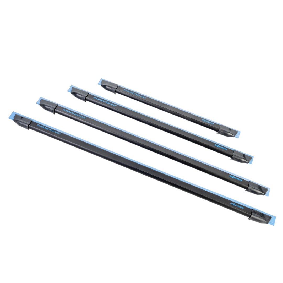 Four long black Moerman Widebody channels, arranged diagonally on a plain white background.