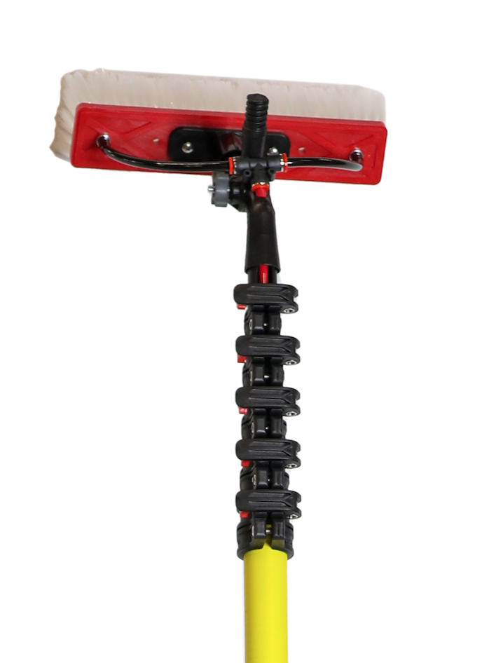 Front view of a water fed cleaning pole with a red and white brush head attached at the top, showing the pole's length and clamps.