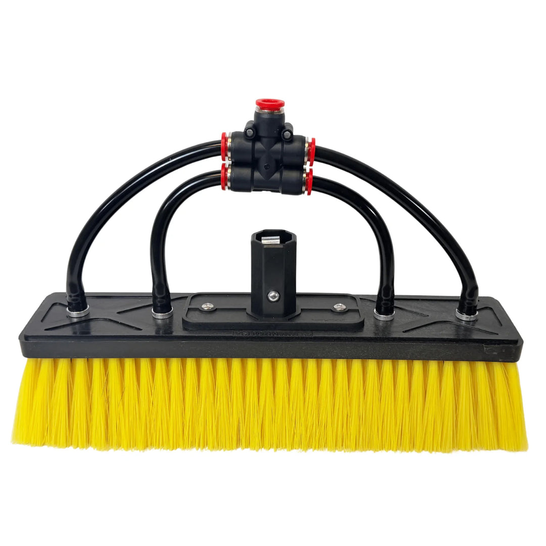 Front view of the Tucker Glide Hybrid water-fed brush with yellow bristles, four black water lines, and center pole socket.