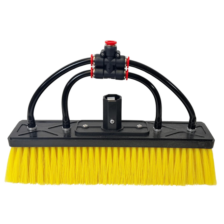 Front view of the Tucker Glide Hybrid water-fed brush with yellow bristles, four black water lines, and center pole socket.