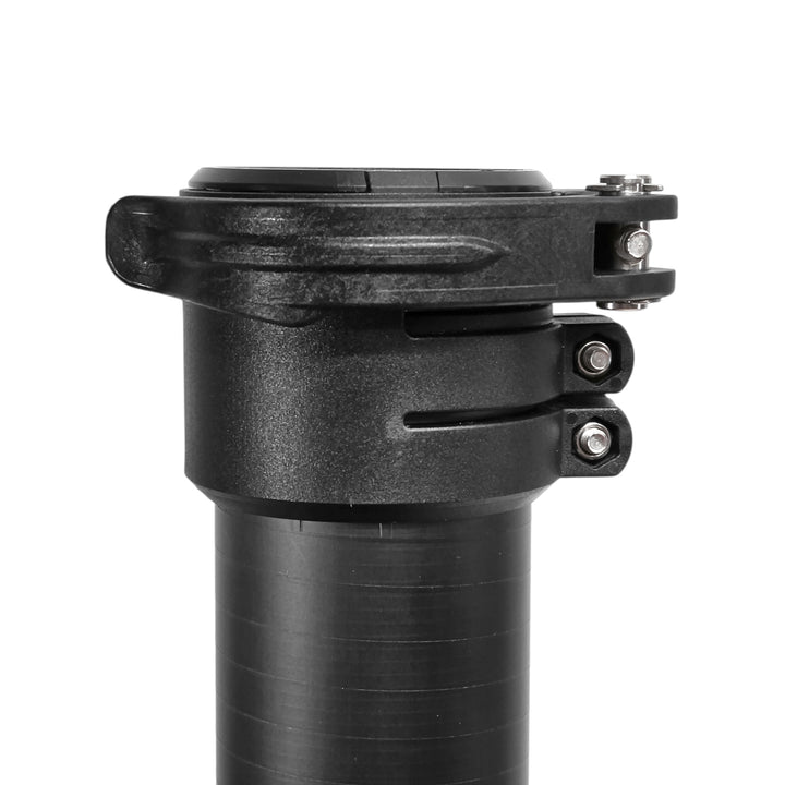 Close-up of a black plastic clamp attached to carbon fiber tube, shown on a plain white background.